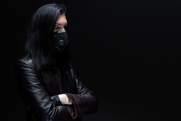 Portrait of the brunet man in mask