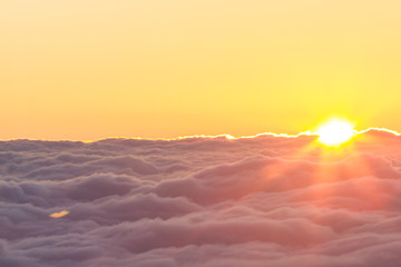 sunrise above the clouds