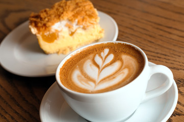cappuccino cup with cake