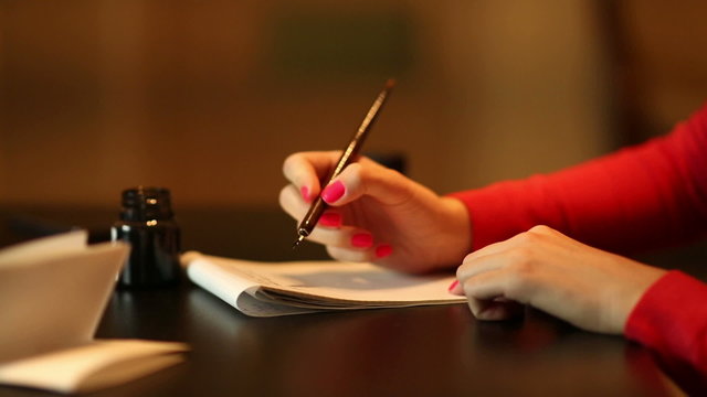 Woman write something