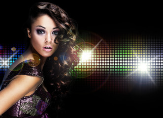 Beautiful young woman dancing