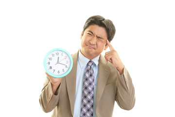 困惑した表情のビジネスマン