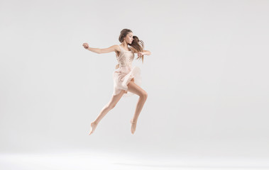 Fototapeta na wymiar Talented ballet dancer in athletic jump