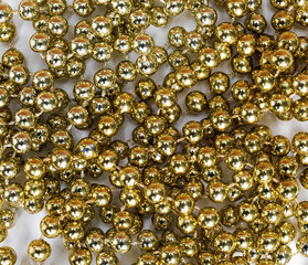 Christmas texture with golden ball chain