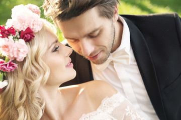 Delicate bride with handsome groom