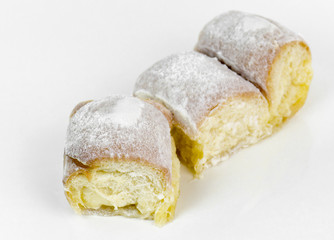 Butter bread and sugar on white background
