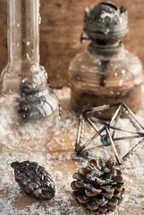 old-fashioned kerosene lamp,Christmas toys,pine cones