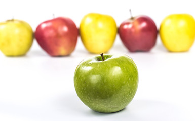 green apple on the background of colored lines apples