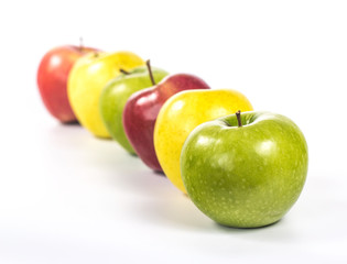 line of colorful apples in perspective