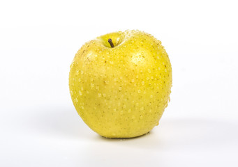whole yellow apple, isolated on a white background