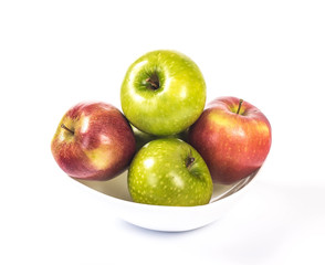 multicolored apples in a white bowl