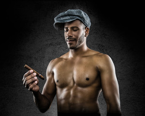 fitness model looking at cigar