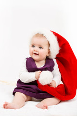 Child girl with Christmas santa hat