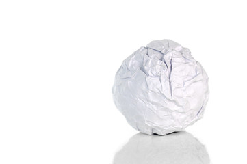 Crumpled paper ball on white