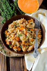 Rice with pumpkin and fish