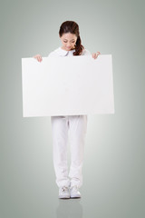 nurse with blank board