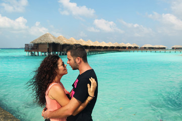 Fototapeta na wymiar Happy couple in Maldives
