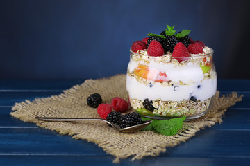 Healthy breakfast - yogurt with  fresh fruit, berries and