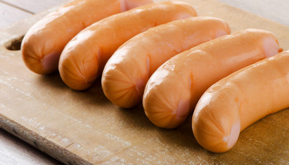 Sausages  on a  cutting board