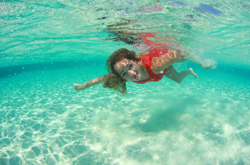 beautiful woman lady in red swim dress water sea