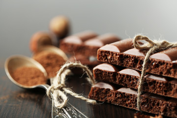 Tasty porous chocolate on table, close up