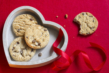 Christmas cookies with red ribbon closeup