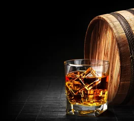 Rolgordijnen Glass of cognac on the vintage wooden barrel © Aleks_ei