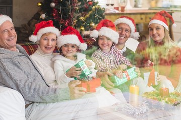 Fototapeta na wymiar Three generation family celebrating christmas
