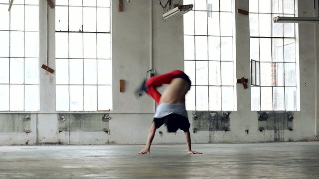 Guy Dancing Breakdance In The Old Hall