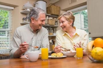 Senior couple having breakfast together