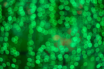 Circles of light on green background