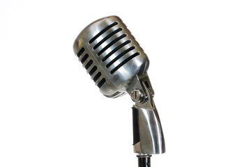 Silver vintage microphone in the studio on white background
