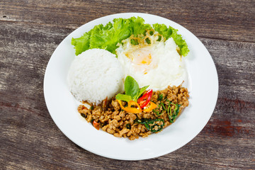 Rice topped with stir fried minced pork and basil
