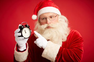 Santa with alarm clock