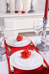 Festive table setting on room background