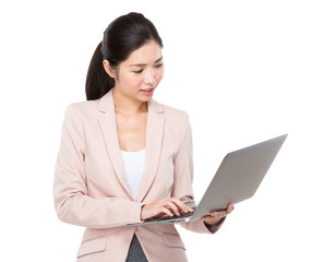 Businesswoman use of laptop computer
