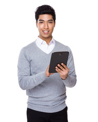 Fototapeta na wymiar Business man use of tablet