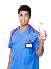 Doctor hold with water bottle