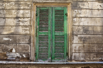 Shutter on the facade of an old French house