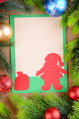 Fototapeta na wymiar Handmade Christmas card with Christmas decorations
