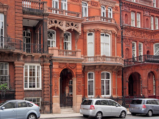 Fototapeta na wymiar London street with parked cars