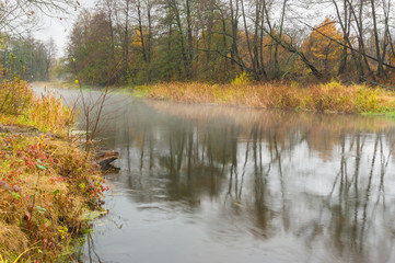 Autumnal mist over Vorskla river in Ukraine