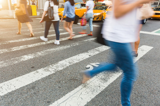 People Walking On Zebra Crossing