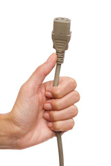 Gray IEC 3 pin power supply plug in female hand