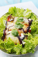 rolls of eggplant and garlic sauce