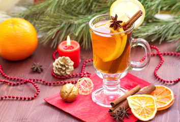 Glass of mulled wine with christmas decoration
