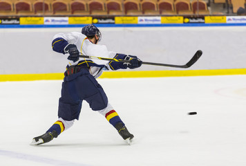 Ice Hockey - Player makes a slapshot