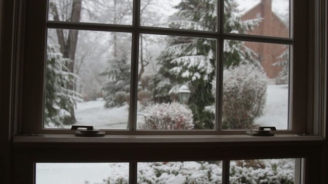 Snowfall Through House WIndow