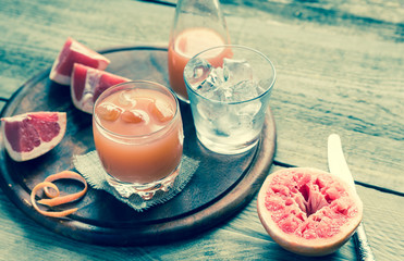 Grapefruit fresh on the wooden table