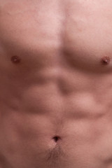 young muscle man chest and abdominals